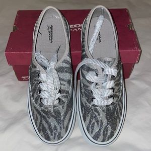 NWOT silver zebra sneakers